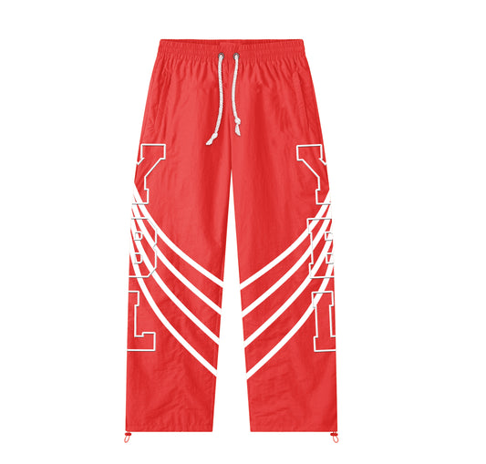 Red nylon trackpants